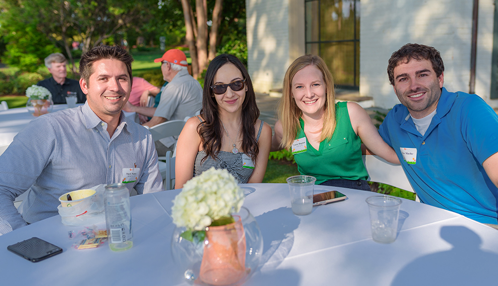 From left: Mark Nunes BS’11, MS'13 and girlfriend Gabriela Ramirez catch up with Laura Shagman BS’11, MSEE’12 and her fiancé, Steve Mueller.