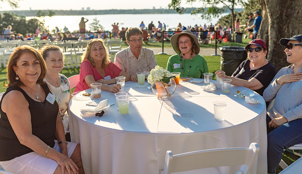 Jeanine Chavenson MS’79 (left) reminisces about her time at UT Dallas with her attending guests.