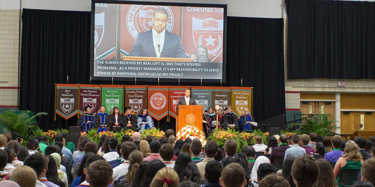 Desmond Blair addresses the graduation audience