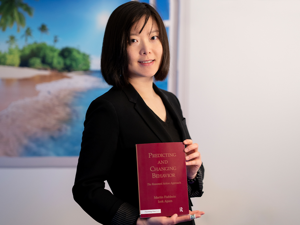 Woman holding book