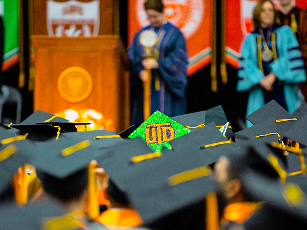 Graduation cap with the UTD monogram