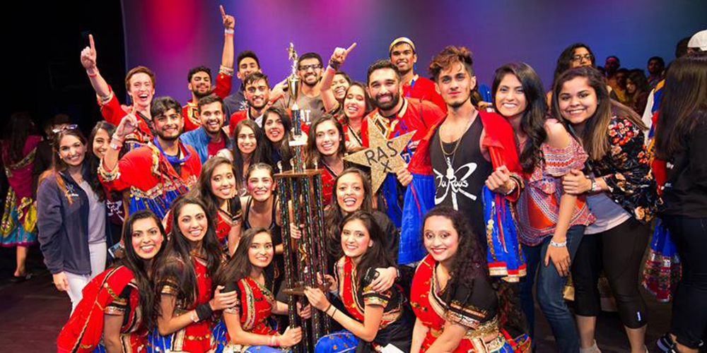 Dance team with trophy