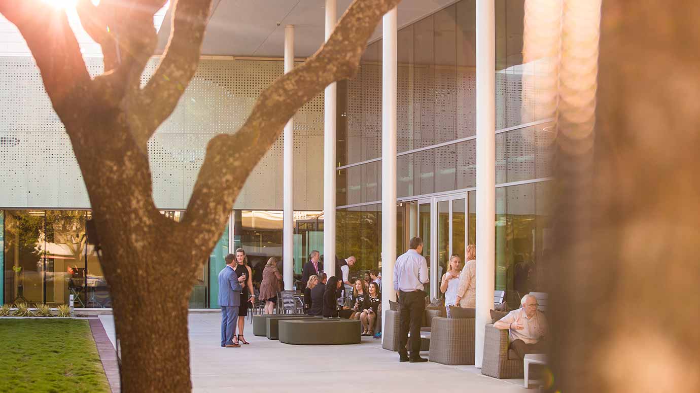 During the reception and open house, guests gathered on the Porch, which features multiple gathering spots and custom-shaped UTD seating.